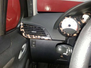 interior vinilo leopardo peugeot 207